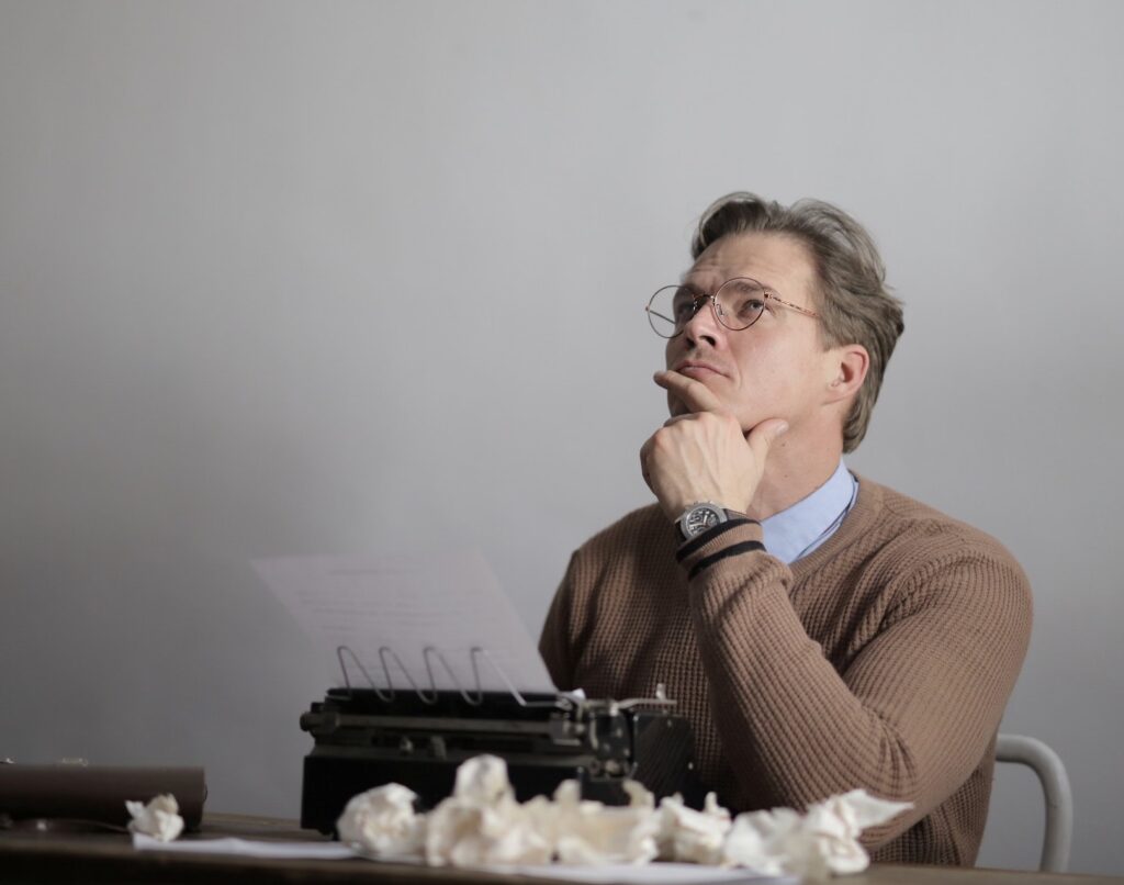 thoughtful writer creating new article